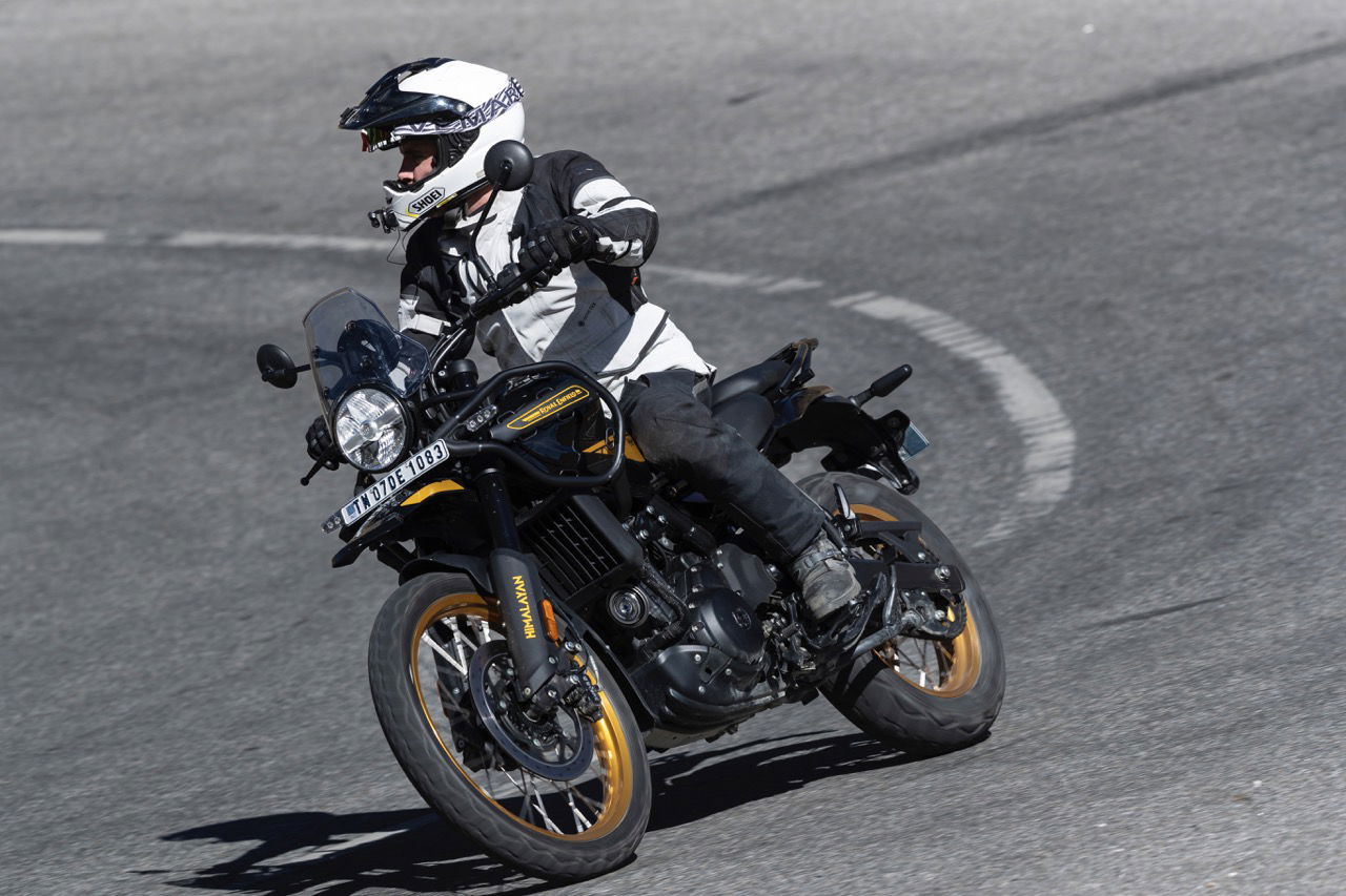 A Royal Enfield motorcycle heading into a hairpin bend
