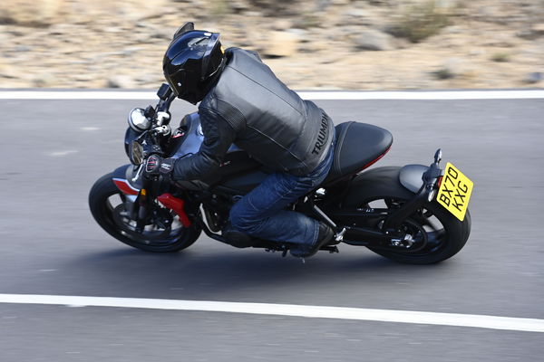 Triumph Trident cornering on a mountain road