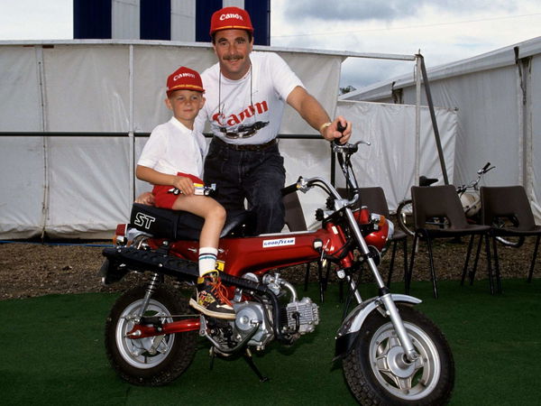 Nigel Mansell with his Ferrari branded Honda DAX ST50