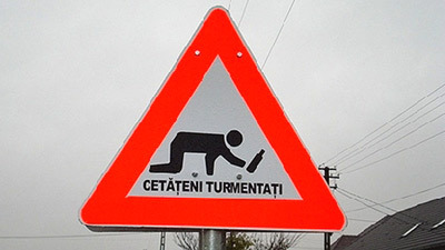 Romanian authorities erect road signs to protect drunk pedestrians