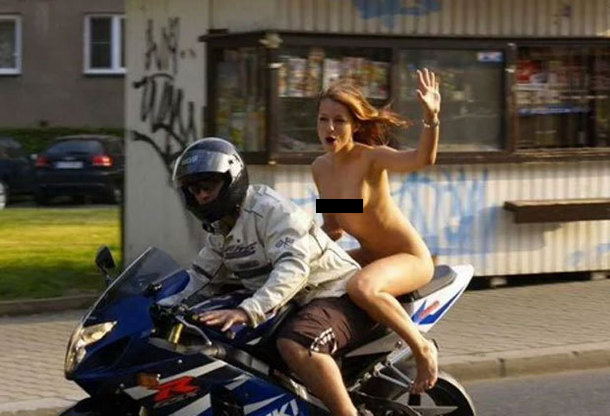 Nude pillion warned for not wearing a lid