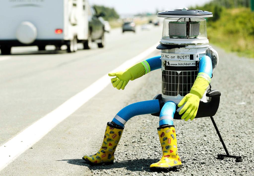 Hitchhiking robot one motorcycle ride away from final destination