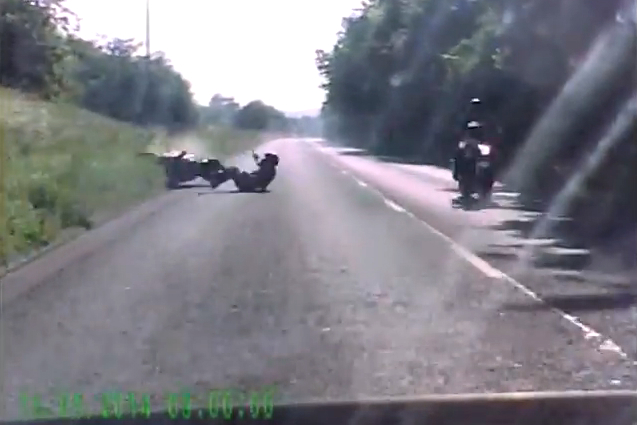 Police footage shows wheelie crash from rider and driver's view