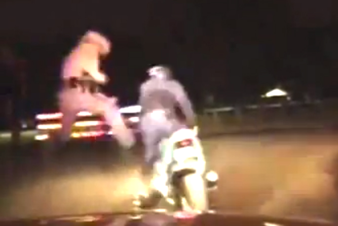 Cop shoots biker then karate kicks him