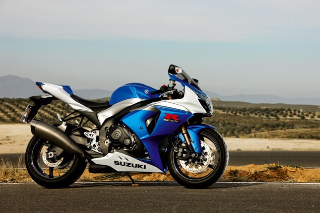 A blue and silver 2009 Suzuki GSX-R1000 K9 parked on a road