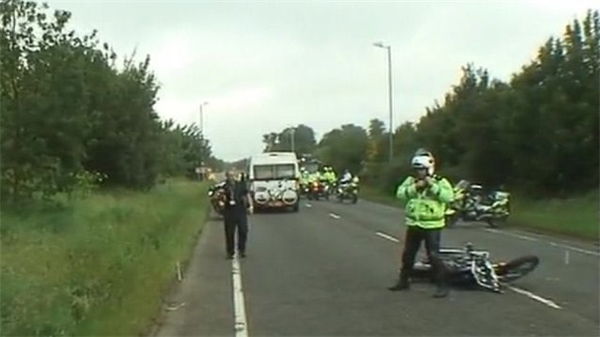 Motorcycle crash delays Olympic torch