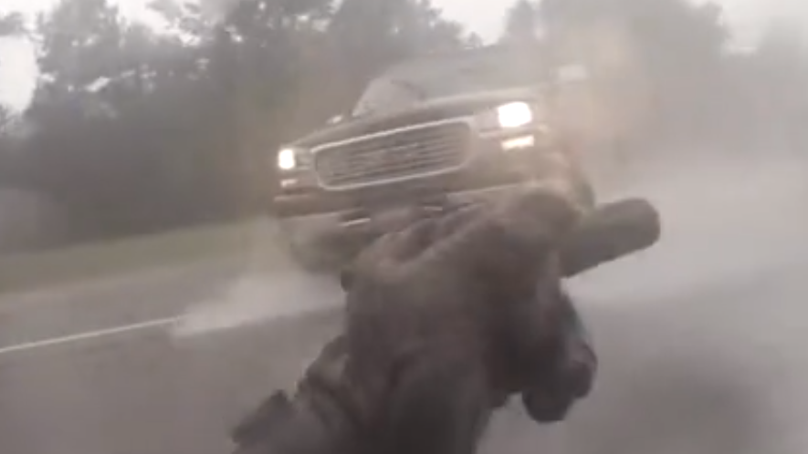 WATCH: Biker gets rear-ended by a truck