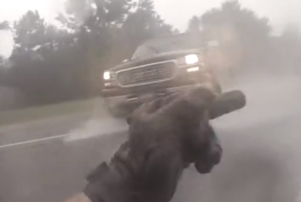 WATCH: Biker gets rear-ended by a truck