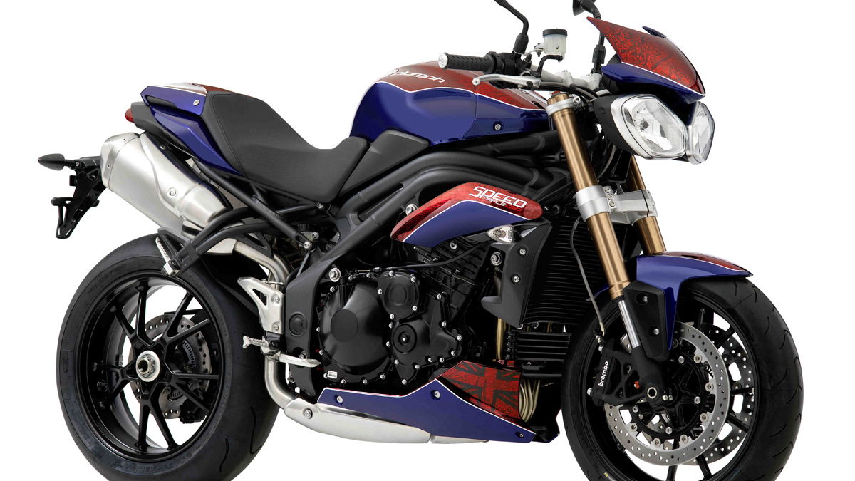 Ross Noble celebrating 500,000th Triumph