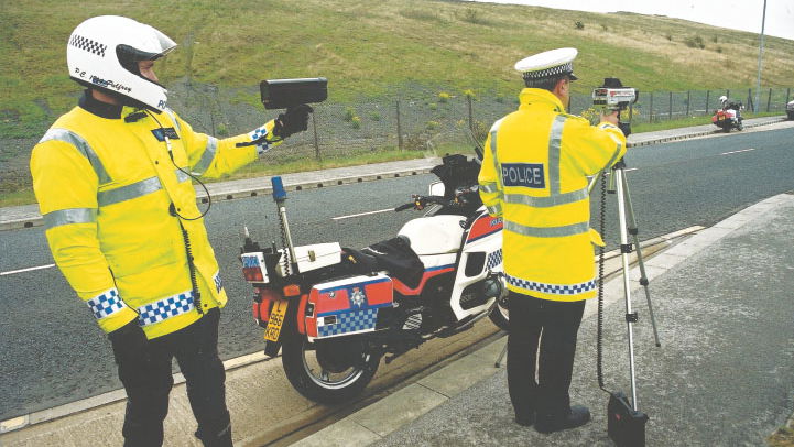 Police hide in bushes to catch speeders