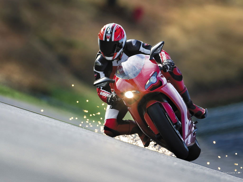 Nude pillion warned for not wearing a lid