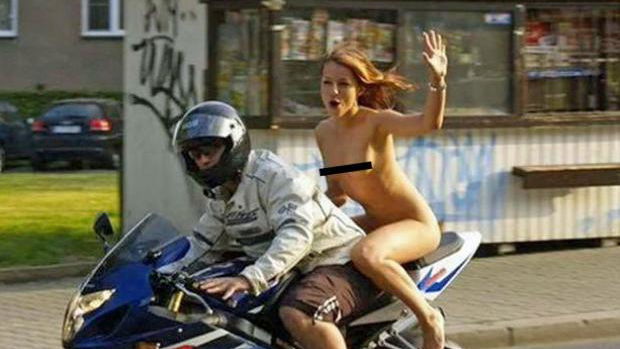 Nude pillion warned for not wearing a lid