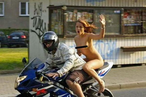 Nude pillion warned for not wearing a lid