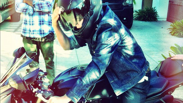 Justin Bieber pictured on a Suzuki motorcycle