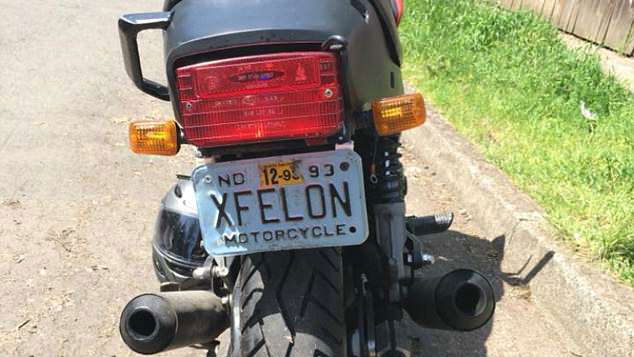 American ex-con nicked on bike with ‘Xfelon’ plate