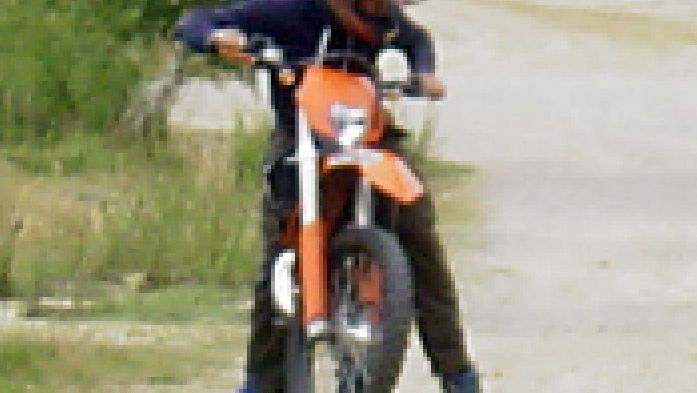 Help find stolen-motorcycle-riding dog killer