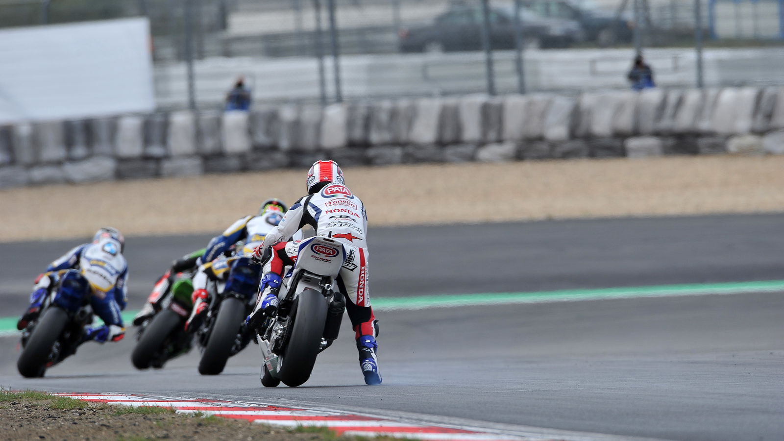 Rea breaks femur after hitting oil