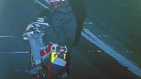 Cover-up biker sought by Police