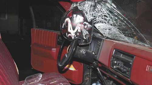 Biker escapes serious injury after head goes through car windscreen