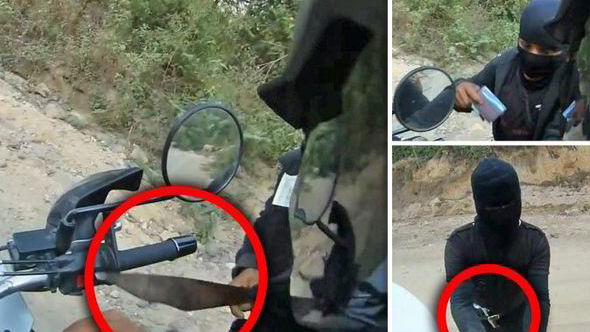 Video: Biker and his girlfriend robbed at gunpoint by masked bandits