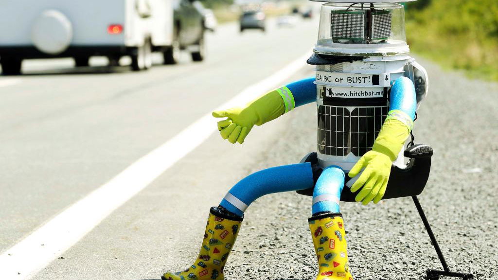 Hitchhiking robot one motorcycle ride away from final destination