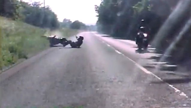 Police footage shows wheelie crash from rider and driver's view