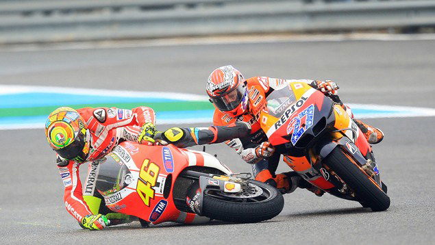 Rivals Rossi and Stoner back on track again