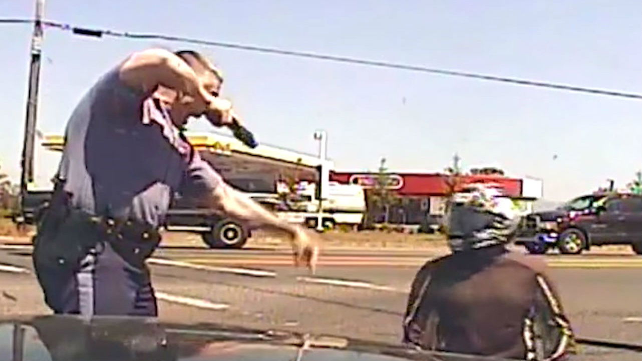 Oregon rider wins $180,170 case against kicking cop