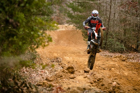 BLACK_RIFLE_COFFEE rider Pastrana on a dirt bike