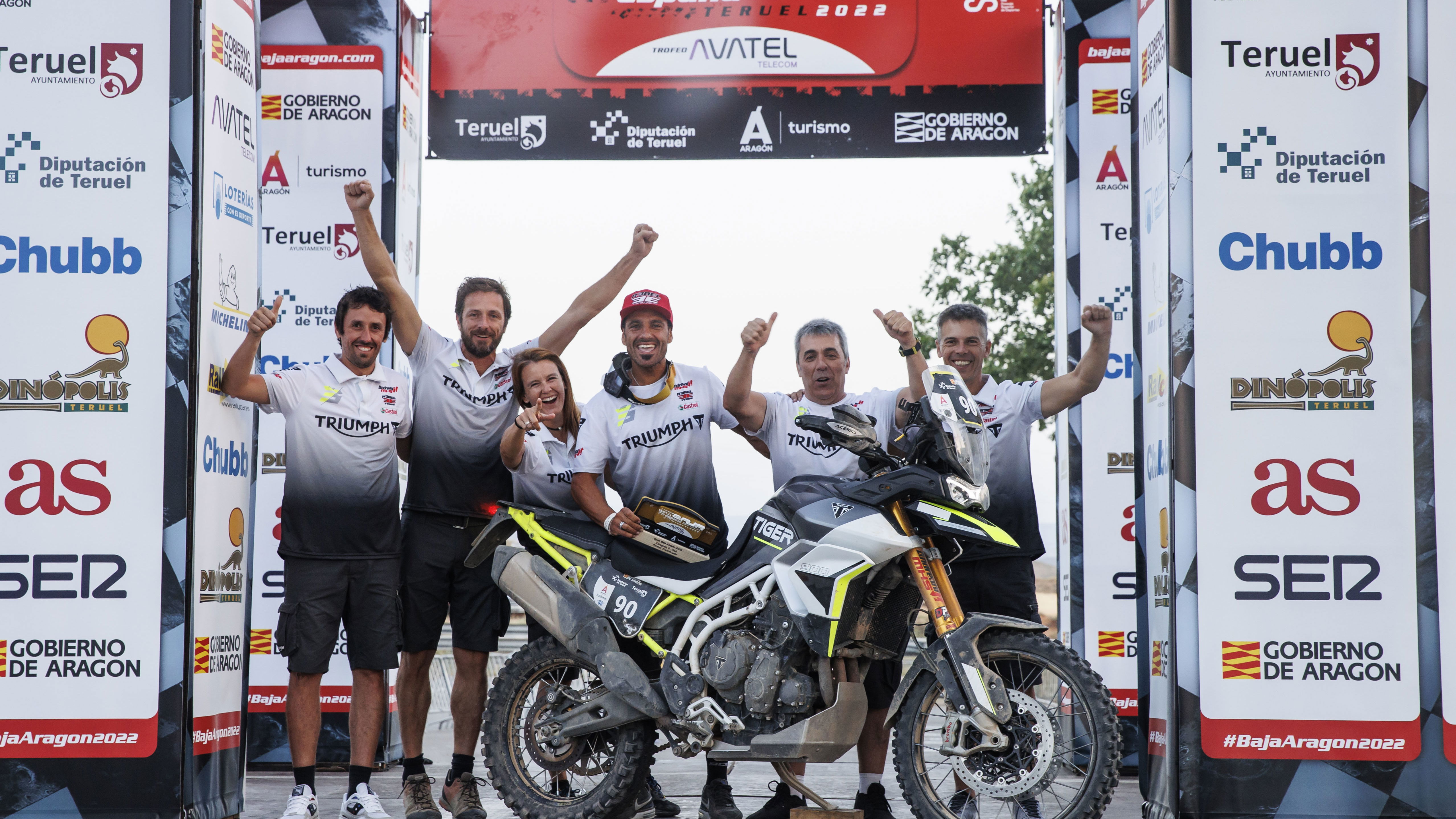 Ivan Cervantes and Triumph team on 2022 Baja Aragon podium with Tiger 900 Rally Pro. - Triumph