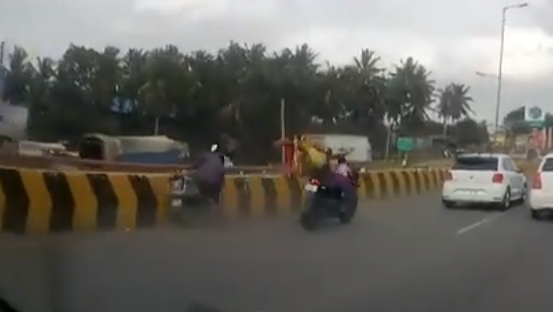 Baby left riding motorcycle after parents fall off