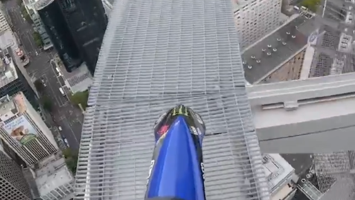 WATCH: Terrifying moment FMX rider teeters along 1000ft high walkway
