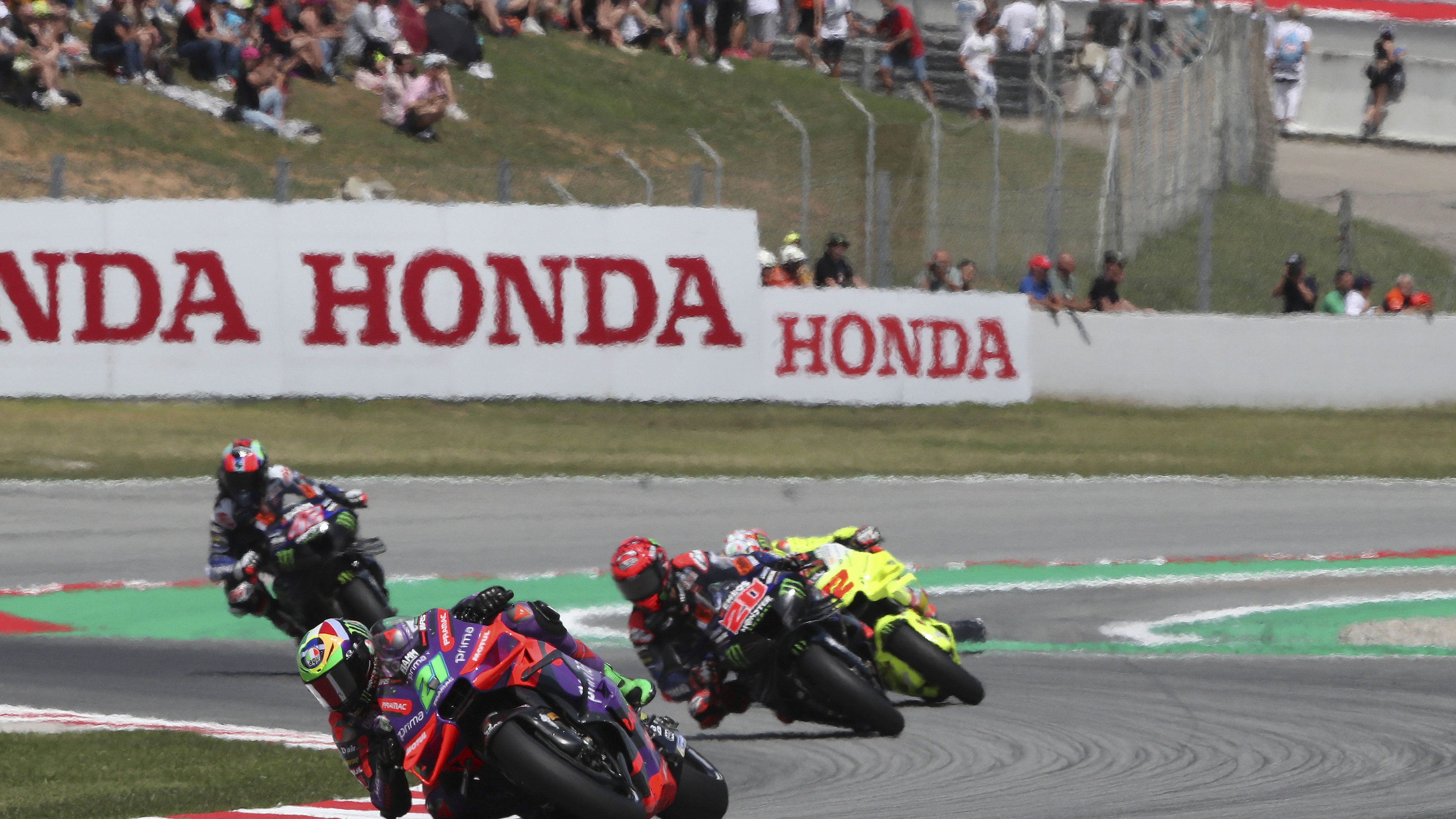 Franco Morbidelli leads Fabio Quartararo, 2024 MotoGP Catalan Grand Prix. - Gold and Goose