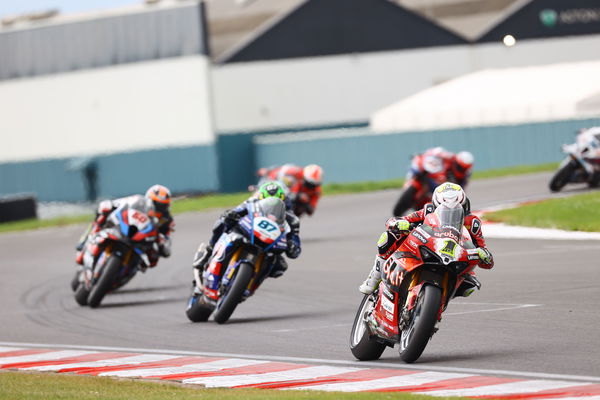 Alvaro Bautista leads Remy Gardner, 2024 UK WorldSBK. - Gold and Goose