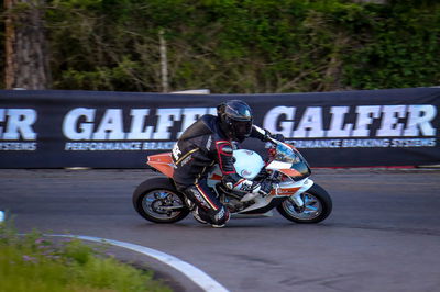 A MiniGP bike going around a corner