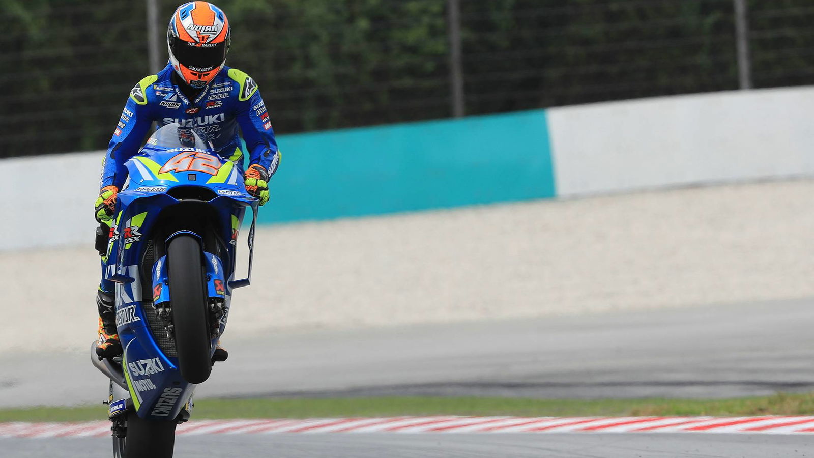 ‘On fire’ Rins powers to the front at Sepang
