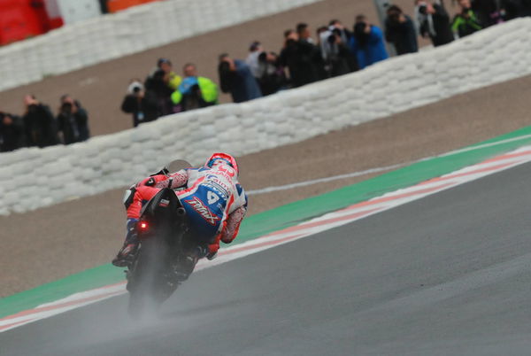 Petrucci skates clear of Marquez in soaking wet FP2