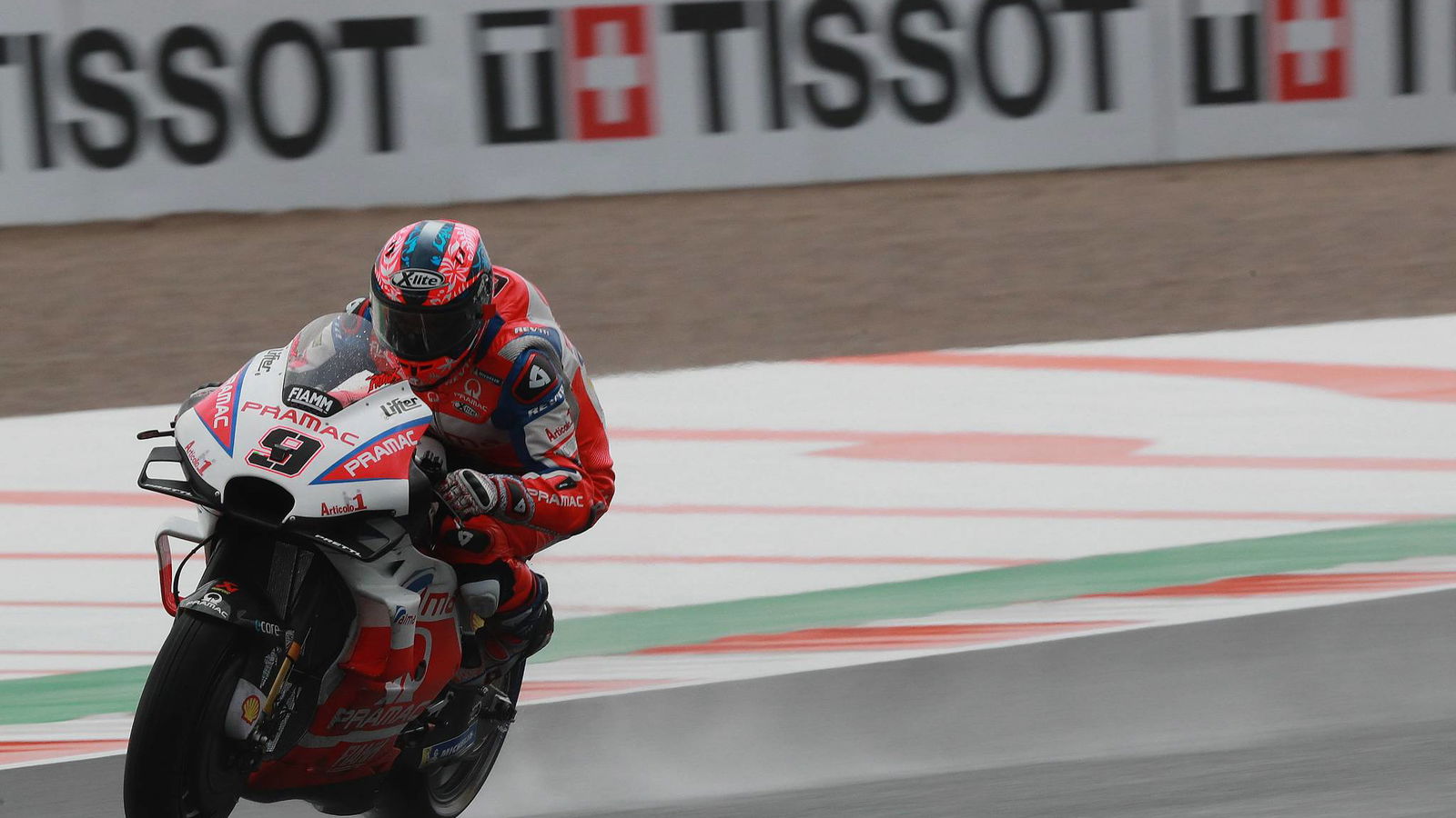 Petrucci skates clear of Marquez in soaking wet FP2