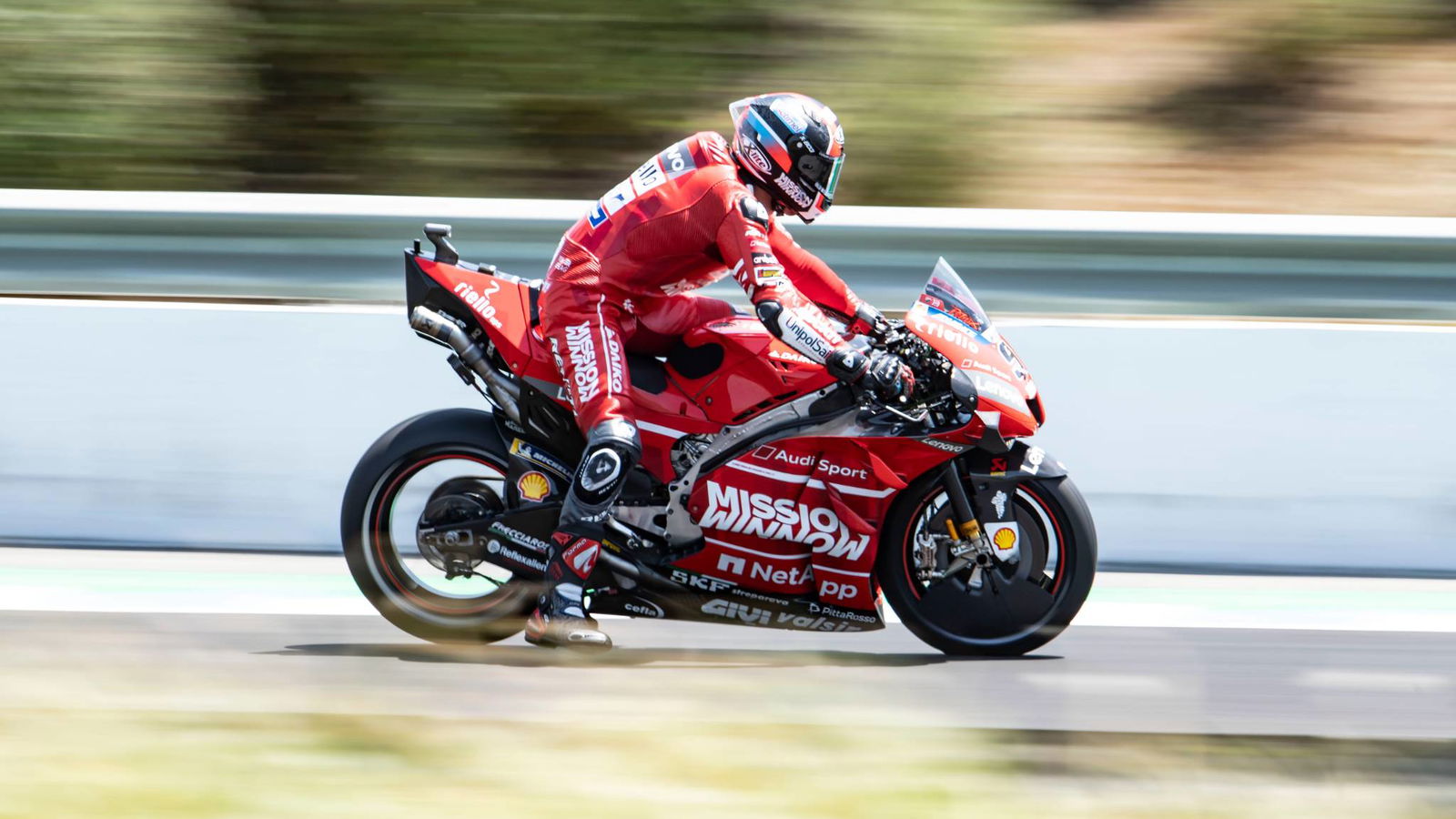 Petrucci beats Marquez with lap record, Rossi in Q1