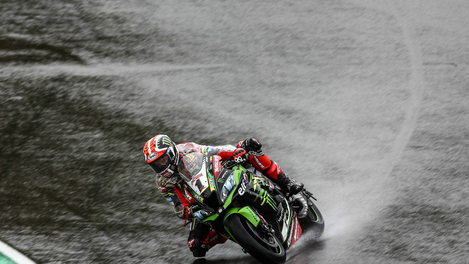 Rea triumphs in wet, wild and red flag-hit Misano opener