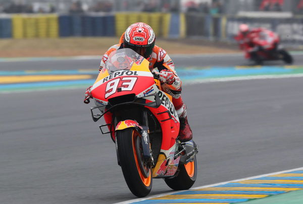 Marquez on pole despite fall in mixed conditions