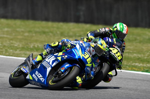 Mir scores points despite Rossi contact