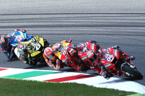 Mir scores points despite Rossi contact