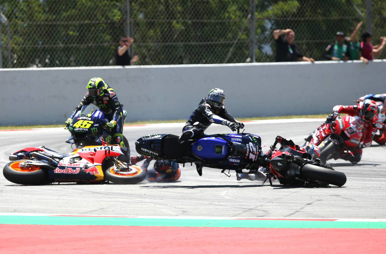 Petrucci survives rubbery brush with Rins for podium