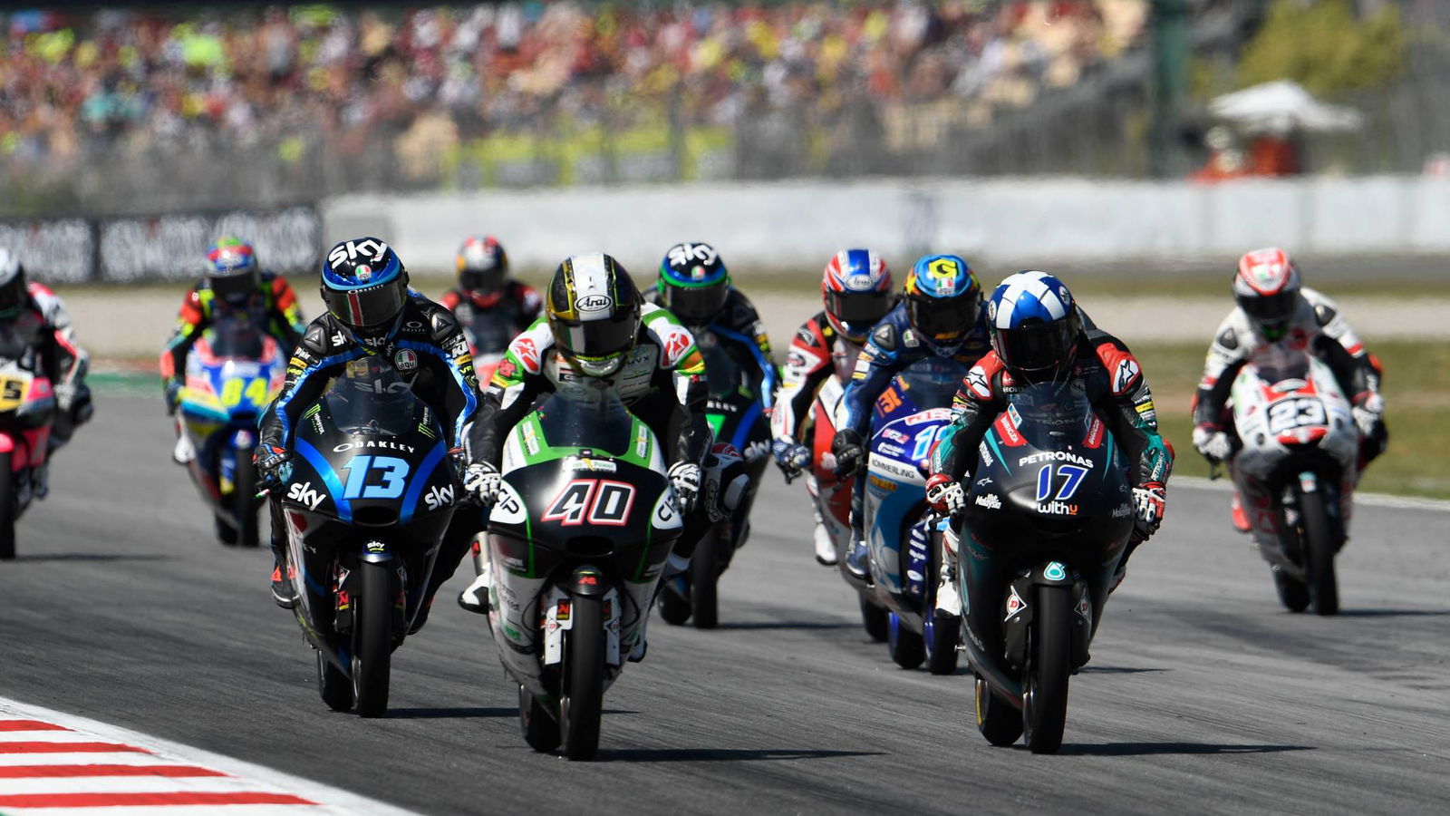 Moto3: McPhee hangs on after last lap highside