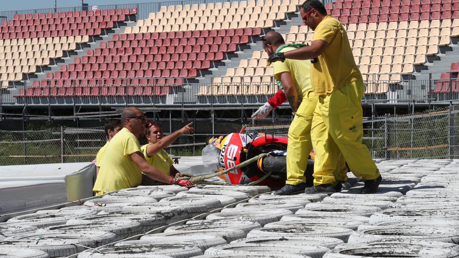 PIC: Lorenzo's bike on the barrier after test fall