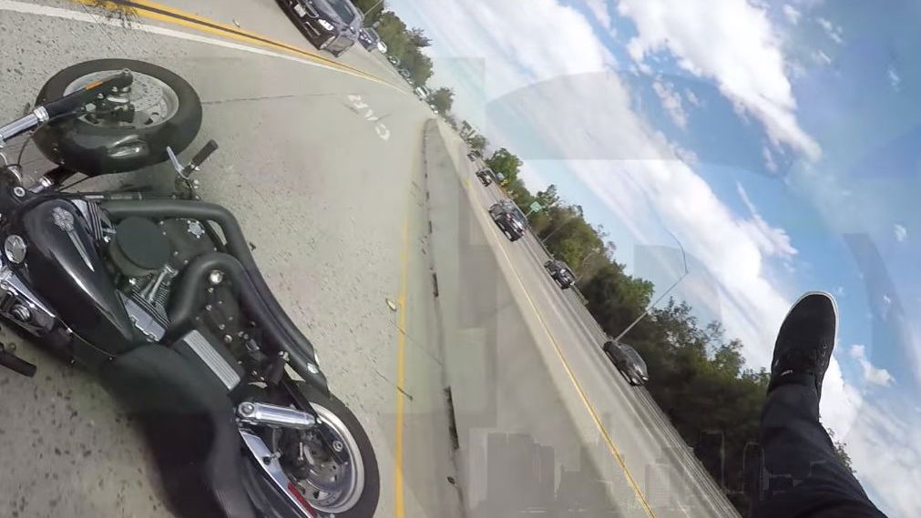 Rider hit roof of car