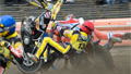 Speedway bike clears safety fence into crowd 