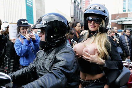 Biker posts compromising pics of wife on 'net