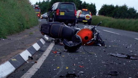 Watch as Reckless Driver Forces Biker to Crash